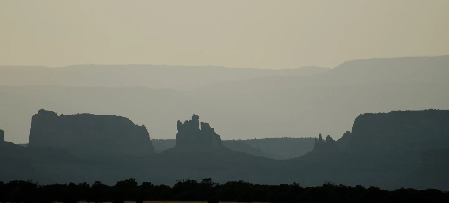 Layered desert buttes at dusk — fine art landscape print by Rick Nye Photography