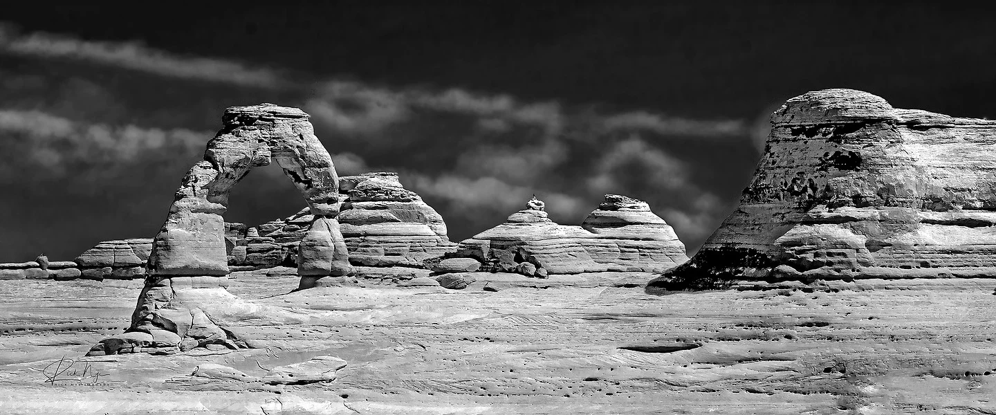 Dramatic Utah arch under storm light — fine art print by Rick Nye Photography